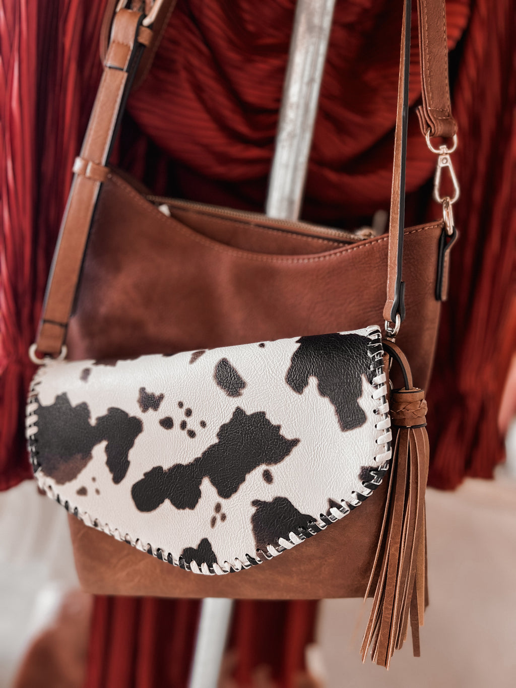 "Turnpike" Cow Print Crossbody